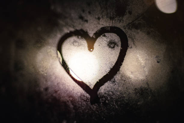 istock Heart on frosted glass 1294293858