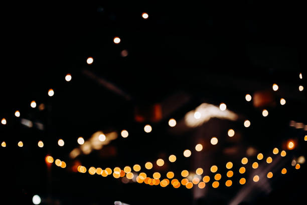 istock retro street garlands yellow light beautiful blur 1294305940