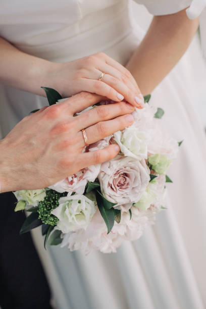 istock hands bride groom together tenderness couple love 1294305941
