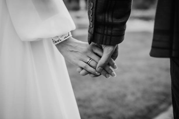 istock hands bride groom together tenderness couple love 1294305945