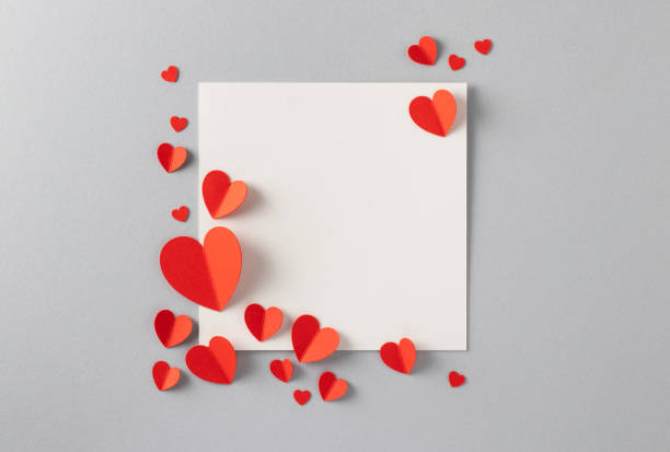 istock Red paper hearts with blank white note for Valentine’s Day message. 1294306244