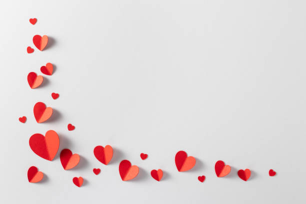 istock Red paper hearts border on white paper background for Valentine’s day. 1294307113