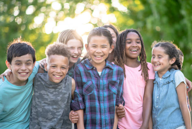 istock Multi ethnic group of elementary age children outdoors 1294307429