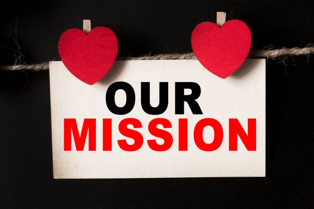 istock a sheet on a black background with text OUR MISSION . business concept 1294308319