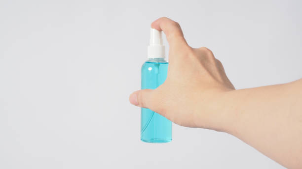 istock Hand is holding Alcohol Spray on white background. 1294308878
