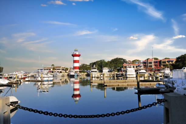 lighthouse at harbor town-hilton head, sc - marina nautical vessel sailboat harbor imagens e fotografias de stock