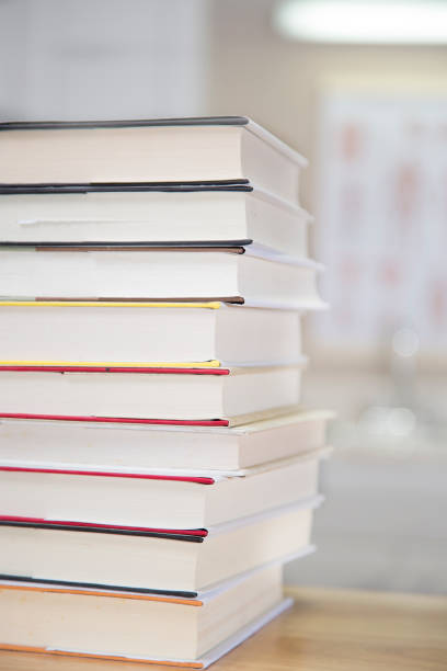 istock Textbooks on wooden desk. 1294311269