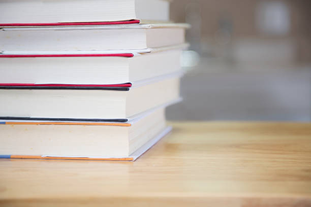istock Textbooks on wooden desk. 1294311319