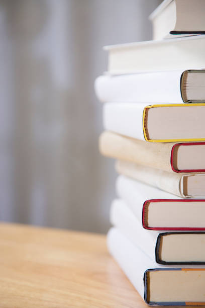 istock Textbooks on wooden desk. 1294311348