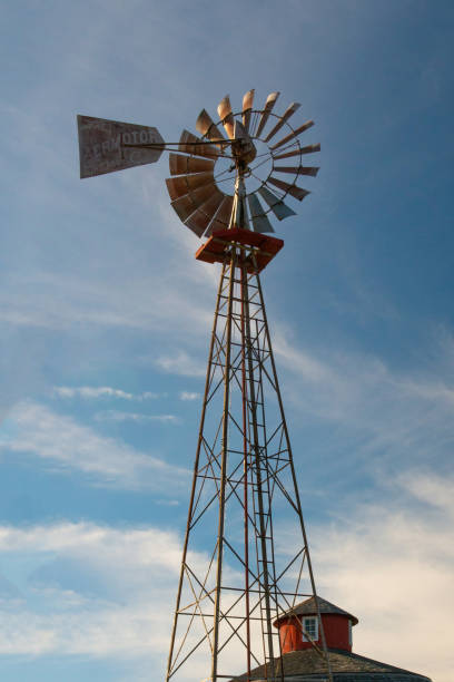 istock Windmill with Clouds in the background-Howard County Indiana 1294311383