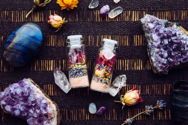 Handmade spell jar bottles with good intentions for home protection and inner balance. Filled with Himalayan rock salt, dried herbs flowers and semi precious stone chips. Magical item.