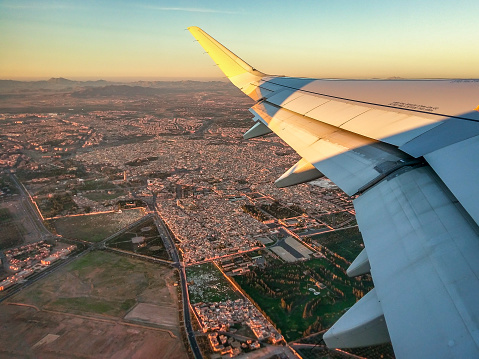 Aerial view of Marrakesh at sunset from an airplane. Morocco