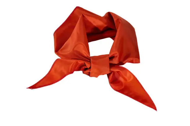 Silk scarf or red tie isolate on white background close-up.