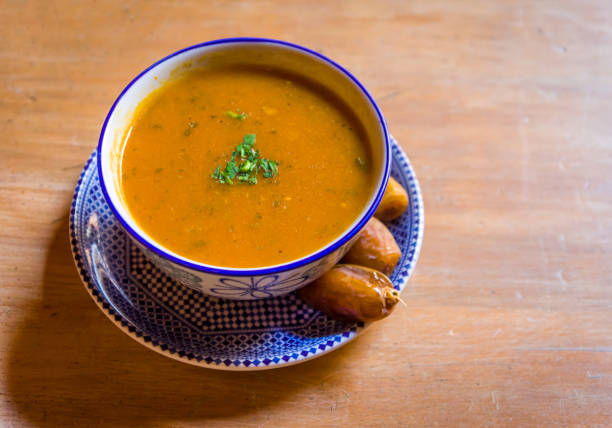 Traditional bowl of Moroccan harira soup and dates, Marrakesh