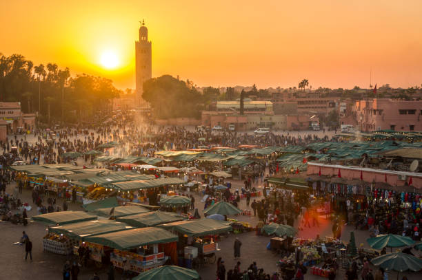 istock Djemaa El Fna Square and Koutoubia Mosque at sunset, Marrakech, Morocco 1294317844