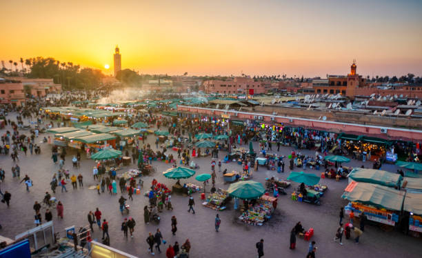 istock Djemaa El Fna Square and Koutoubia Mosque at sunset, Marrakech, Morocco 1294317848