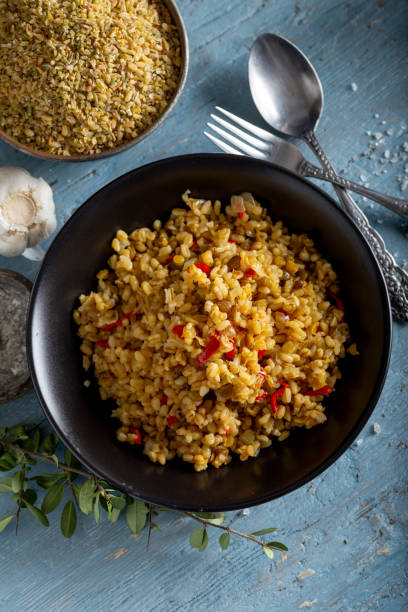 istock Bulgur pilaf with lentil (green, red and yellow) and vegetable. 1294324710