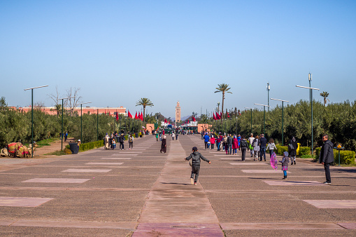 Marrakech, Morocco - January 22, 2018: tourists and locals in the Road to Menara gardens in Marrakech, Morocco