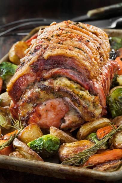 istock Stuffed Pork Roast with Roasted Vegetables 1294325869
