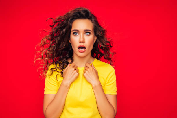 istock Attractive shoked young woman 1294326993