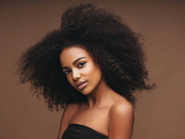 istock Beautiful girl with curly hairstyle 1294329059