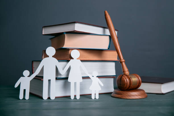 paper of family and books with judge stock photo