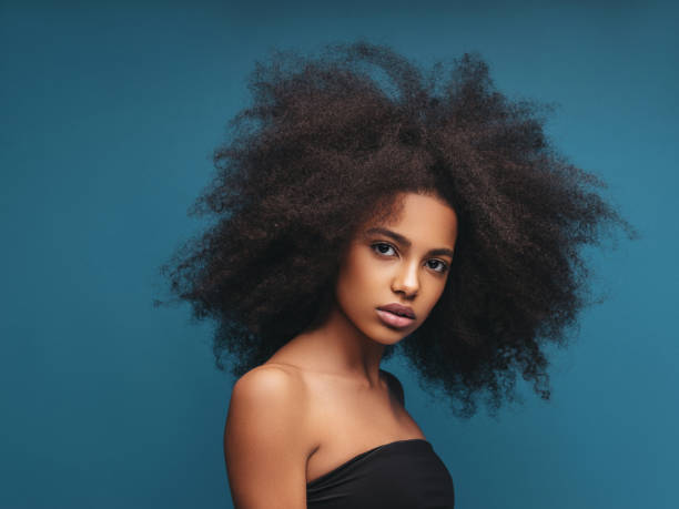 istock Beautiful girl with curly hairstyle 1294329477