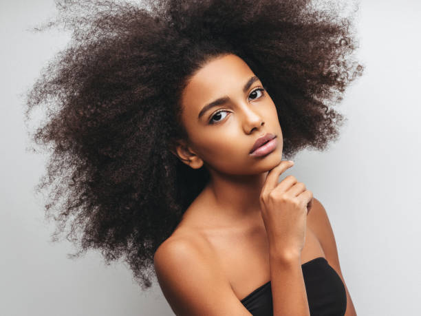 istock Beautiful girl with curly hairstyle 1294329534