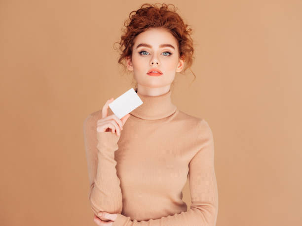 istock Beautiful woman holds placard 1294331507