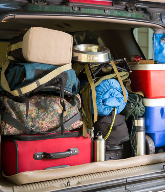 istock Packing vehicle for camping vacation trip. 1294331973