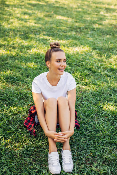 istock Woman relaxing at the park 1294336472