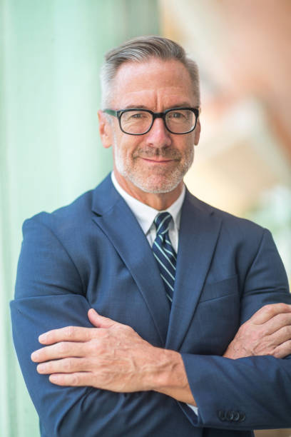 istock Handsome mature businessman at work 1294339490