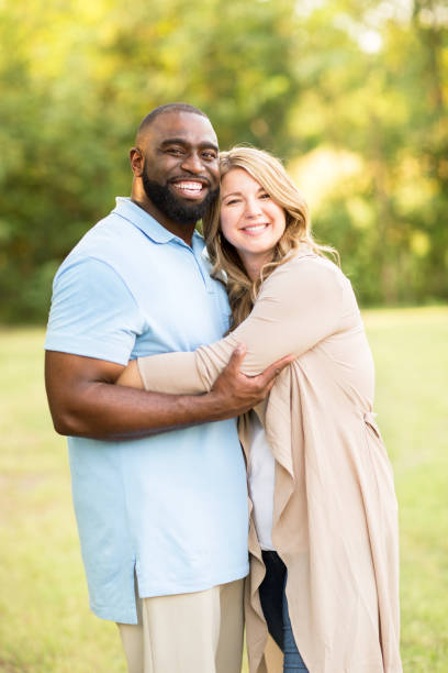 istock Loving mixed race couple hugging. 1294340281