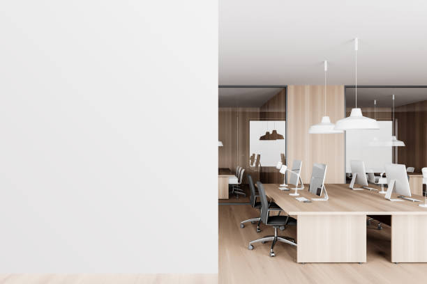 istock Wooden open space office interior with mock up wall 1294346376