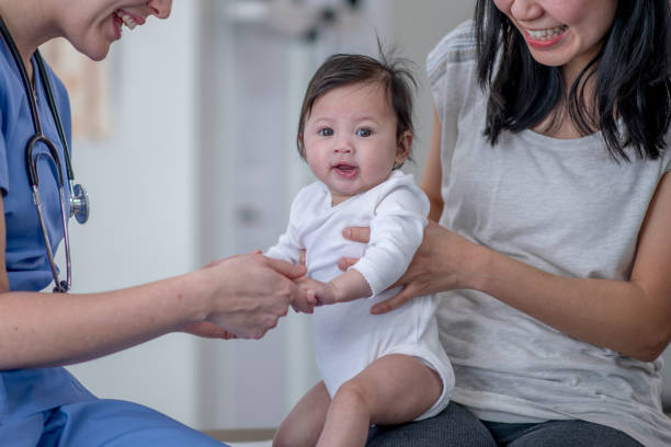 istock Cute Asian baby at the doctor's office 1294349374