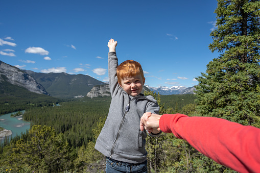 POV of Little Boy and Mother Looking at Bow River After Hiking in Banff on a Summer Day