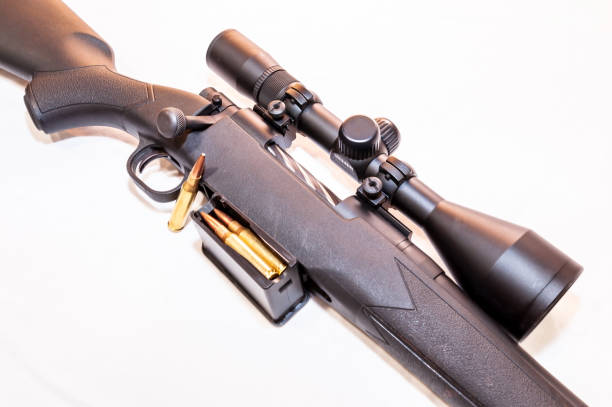 istock A black rifle with ammunition next to it 1294351836