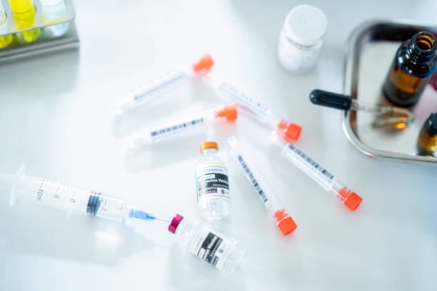 istock COVID-19 Vaccine bottle and test tubes 1294355458