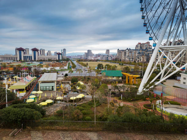 istock An empty road under the ferris wheel in a city park 1294362579