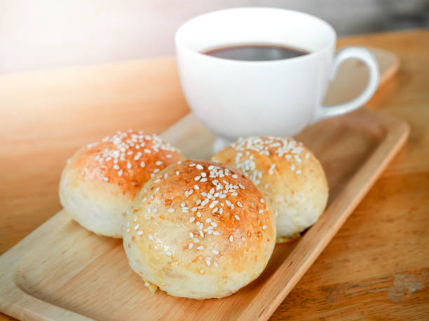 istock Fresh homemade burger buns with sesame seed. 1294365528
