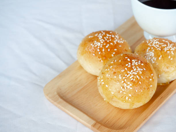 istock Fresh homemade burger buns with sesame seed. 1294365557