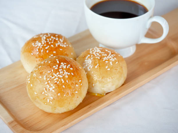 istock Fresh homemade burger buns with sesame seed. 1294366110