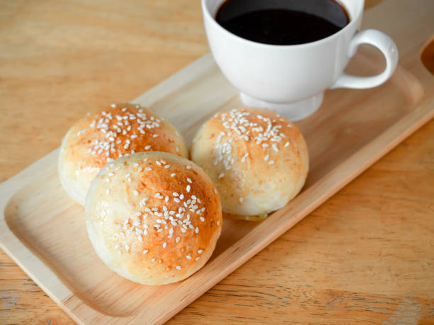 istock Fresh homemade burger buns with sesame seed. 1294366113
