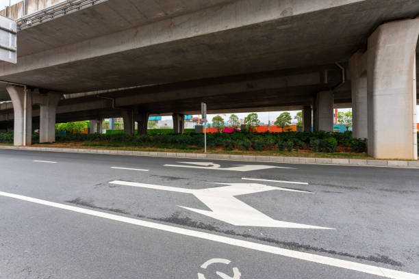 istock Concrete structure and asphalt road space under the overpass in the city 1294366398