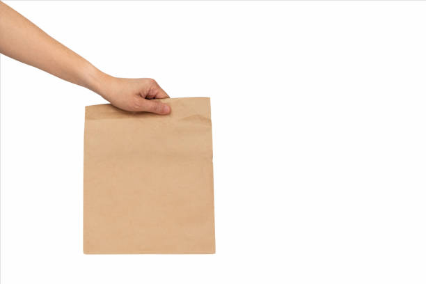 istock mock up-Recycle Craft paper bag mockup isolated on white background. 1294367080