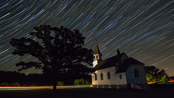 church at night with star trails