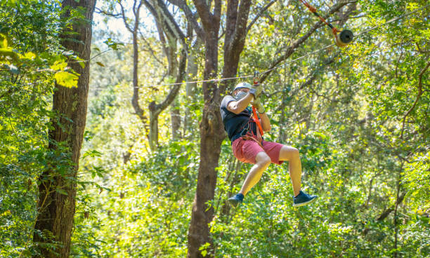 istock Hispanic man on a zip line in Costa Rica 1294374111