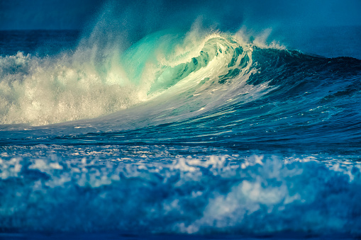 Breaking waves surrounding the Hawaiian Island of Oahu