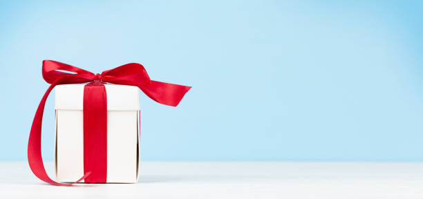 istock Valentines day or Christmas gift box with red bow 1294381832
