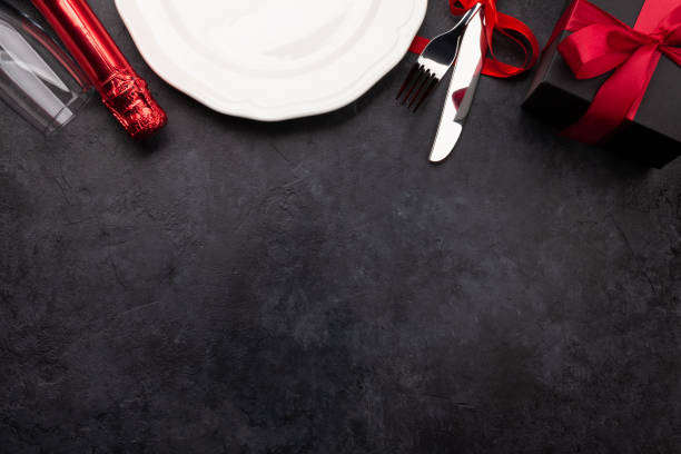 istock Valentines day with plate, champagne and silverware 1294382558